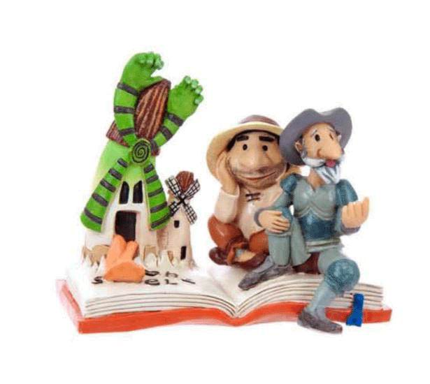 Figure of Don Quixote and Sancho Panza on a Book