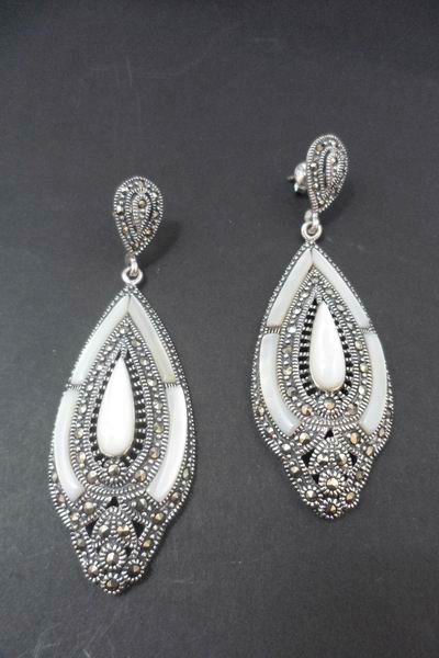 Silver and Marcasite Stones Earrings with Mother of Pearl protracted drop and details on the sides. 6cm