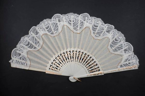 Fan for church. Wood with lace