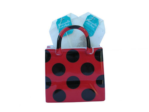 Basket with black polka dots and red background