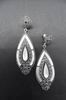 Silver and Marcasite Stone Earrings with Mother of Pearl protracted drop and details on the sides. 6cm 78.430€ #500629089941